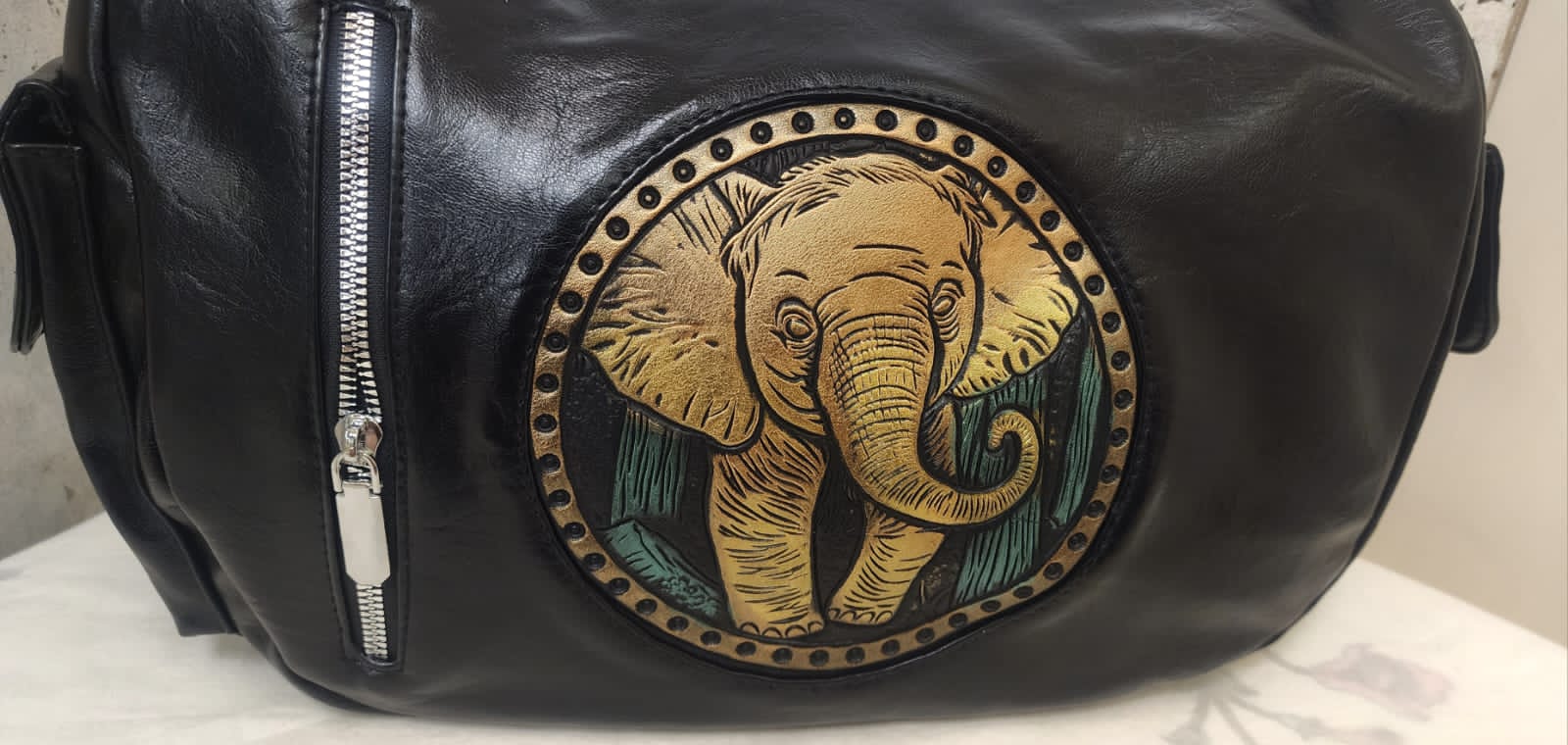 Artisan Embossed Leather Sling Bag